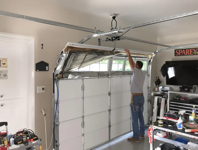 Garage door section replacement by Clearwater Garage Door Repair in Clearwater