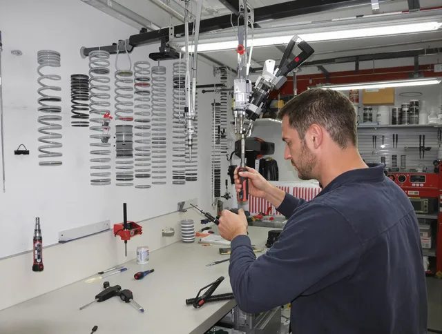 Clearwater Garage Door Repair safety certified technician performing precision spring replacement in Clearwater