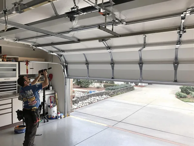 Garage door track repair service by Clearwater Garage Door Repair in Clearwater